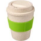 A beige reusable coffee cup with a matching lid and a bright green silicone grip around the middle. The cup has a speckled texture, giving it a natural, eco-friendly appearance.