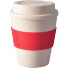 A white reusable coffee cup with a red silicone grip is shown. The cup has a lid and is made of a textured material.