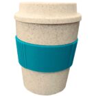 A reusable coffee cup made of speckled beige material with a teal ribbed silicone grip around the middle. The cup has a matching lid.