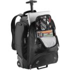 A black rolling backpack with an extended handle, containing a laptop and organized compartments filled with books, documents, and electronic accessories. The front pocket is open, displaying neatly arranged items.