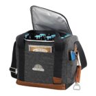 A gray insulated cooler bag with black straps and brown accents, partially open to reveal bottles inside. A bottle opener is attached to the side on a leather strap.
