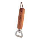 Wooden-handled bottle opener with FIELD & CO. engraved on the handle. A metal opener head is attached at one end, and a leather loop is fixed for hanging. The handle has a natural wood finish.