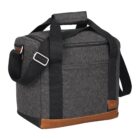 A gray insulated cooler bag with black shoulder and hand straps is shown. It features a brown leather-like accent at the base and a zippered top closure.