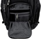 Open black backpack showing its interior compartments, including a mesh pocket, zippered compartments, and slip pockets. The bag has a checkered lining and multiple zippers and pockets for organization.