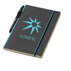 A dark gray notebook with a teal starburst design and the word oceanic on the cover. It features a matching teal elastic band and a black pen attached at the side. The notebook has a minimalist and professional look.