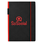 A black planner notebook with a red elastic band. It features the logo SoSocial in red, accompanied by a speech bubble with a heart inside it. The notebook has a red stripe along the spine.