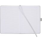 An open notebook with lined pages and a gray ribbon bookmark lies flat. The pages are blank, and theres a gray tab on the right side of the notebook.