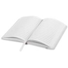 An open notebook with lined pages and a white ribbon bookmark placed in the center. The notebook is positioned against a plain white background.