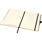 An open notebook with lined pages, lying flat. A black ribbon bookmark is placed between the pages, and an elastic band attached to the notebook is visible on the right side. The cover appears to be a light brown color.
