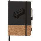 A black notebook with a cork-textured bottom edge, featuring a logo with the word brood. It has an elastic band closure and a pen loop on the right, holding a silver pen.