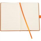 Open notebook with lined pages, featuring a brown cover and an orange ribbon bookmark placed vertically across the right page.