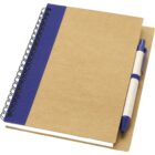 A brown spiral notebook with a blue stripe along the binding lies on a white surface. A blue and white pen is attached to the notebooks right side.