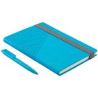 A blue notebook with a geometric pattern in the corner and an elastic band is paired with a blue pen featuring a similar pattern on its grip. The notebook is closed, and the pen is placed to the left.