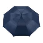 A fully opened, navy blue umbrella viewed from above, showing its eight-panel structure and central hub. The fabric appears smooth and slightly reflective, with a uniform color across all panels.