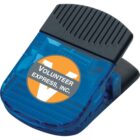 A blue plastic clip with a black ribbed handle featuring a round orange and white logo on the side that reads Volunteer Express, Inc.