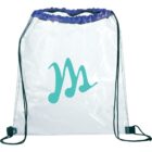 Clear drawstring backpack with black strings, featuring a large turquoise M logo in the center. The bag has a purple fabric trim at the top.