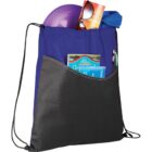 A blue and black drawstring backpack filled with items, including a purple frisbee, sunglasses, a blue cloth, a book, and brochures. A pen is clipped to the edge of a front pocket. The backpack has a simple, sporty design.