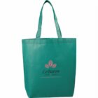 Turquoise tote bag with a pink logo featuring a stylized leaf design and the text LeBaron hotels * resorts.