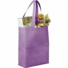A purple tote bag filled with various items, including a box of Gorgonzola cheese, yellow and purple flowers, and cans.