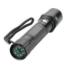 Black flashlight with a wrist strap and a built-in compass on the end.