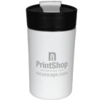 A white travel mug with a black lid. The mug features the logo and text PrintShop and niconcept.com in gray on its side.