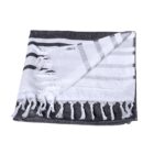 A folded blanket with white and gray stripes, featuring tasseled edges. The design includes alternating solid and striped sections, creating a textured appearance.
