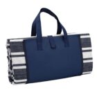 Folded navy and white striped picnic blanket with navy handles, resembling a tote bag.