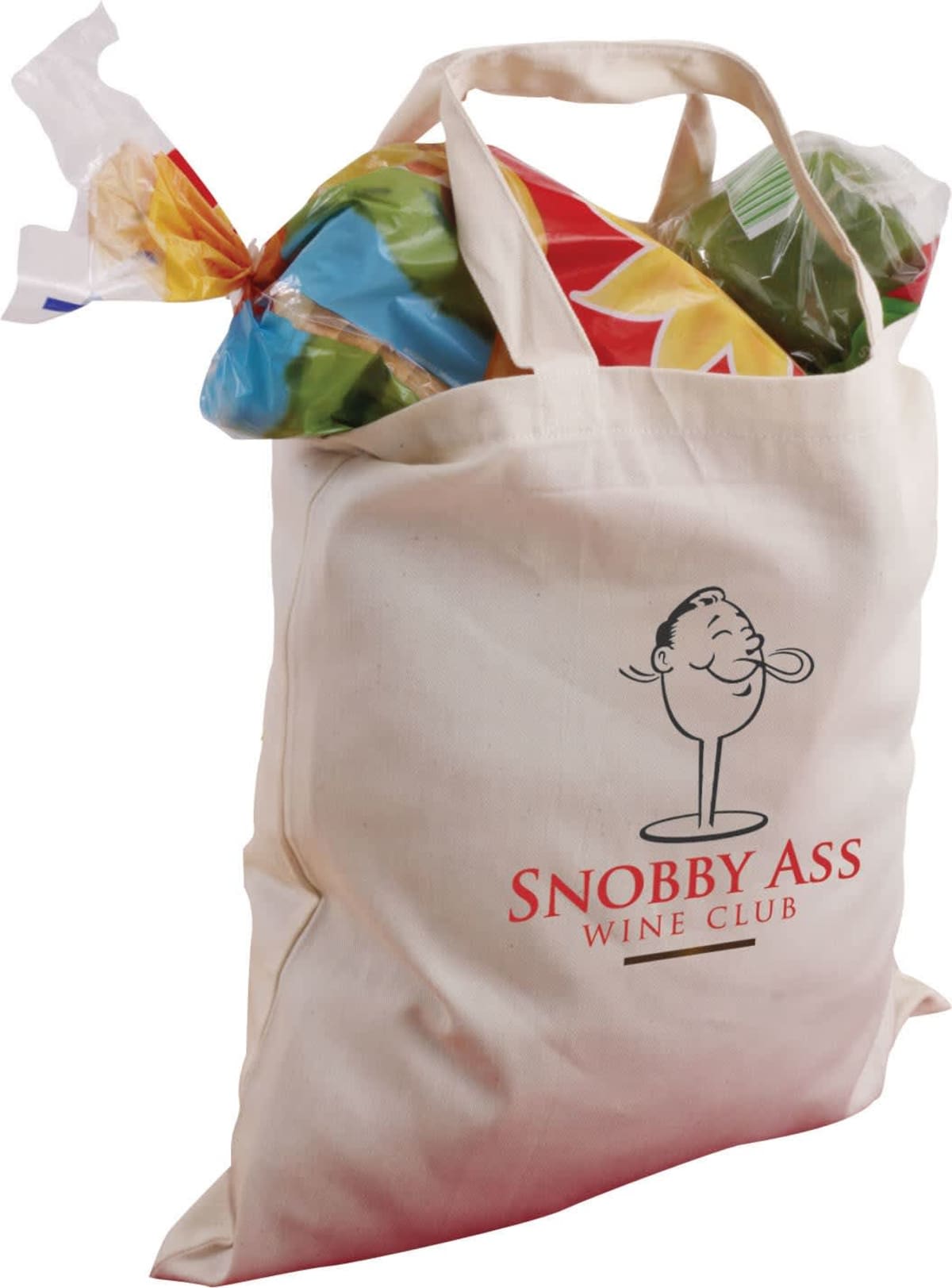 A beige reusable tote bag with Snobby Ass Wine Club printed alongside a quirky face drawing. The bag is filled with colorful packaged bread loaves peeking out.