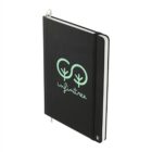 Black notebook with “infinitree” and two tree icons on the cover, elastic band, and ribbon.