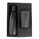 Black insulated bottle and tumbler set in a cushioned box.