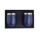 Two blue, stainless steel tumblers with silver rims are placed side by side in a black foam-lined box.
