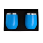 Two blue stainless steel tumblers with silver tops are placed side by side in a black foam-lined box.