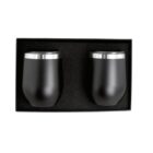 Two black insulated tumblers with silver rims are placed side by side in a black foam-padded box.