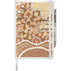 A notebook with a cover featuring an intricate, colorful dot and swirl pattern in earthy tones. It includes designs of circles, arrows, and wavy lines. A silver pen is attached to the side, and a white elastic band and ribbon bookmark are present.