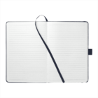 Open notebook with lined pages and a black ribbon bookmark placed diagonally across the right page, on a white background.