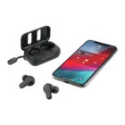 Wireless earbuds with a charging case are placed next to a smartphone with a music player app on its screen. The earbuds are partially inside and outside the case, and the phone displays the time as 9:02.