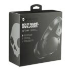 Box packaging for Skullcandy wireless headphones, featuring the slogan Bold Sound, Unplugged. The box showcases an image of black over-ear headphones and highlights features like Bluetooth technology and rechargeable battery life.