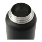 Close-up view of a black, stainless steel thermos with an open top, showing the inner lining. The metal rim is shiny and contrasts with the matte black exterior.