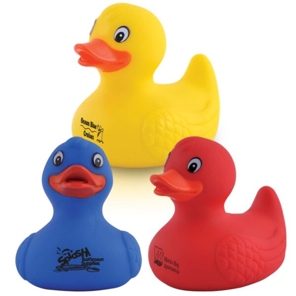 Red, blue, and yellow rubber ducks with various logos on their chests.