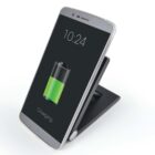 Smartphone on a stand, displaying 10:24 with a green battery icon and Charging text.