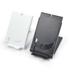 Two collapsible phone stands, one white and one black, side by side.