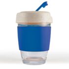Clear reusable cup with a cream lid and blue sleeve, featuring a blue straw.