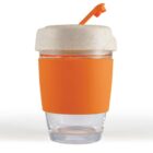 Clear cup with orange sleeve and cream lid, featuring an orange straw.