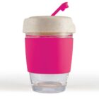 Clear cup with pink band and lid, featuring a pink dolphin-shaped straw.