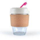 Reusable glass cup with cork sleeve, white lid, and pink straw.