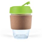 A reusable glass cup with a green lid and cork sleeve.