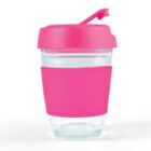 Clear glass cup with a pink lid and sleeve, featuring a flip-top spout.