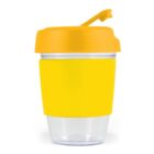 A clear cup with a yellow lid and matching yellow grip.