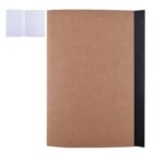 A closed notebook with a brown cover and a black spine next to an open lined notebook.