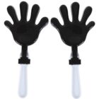 Two black and white hand clappers with white handles, side by side.